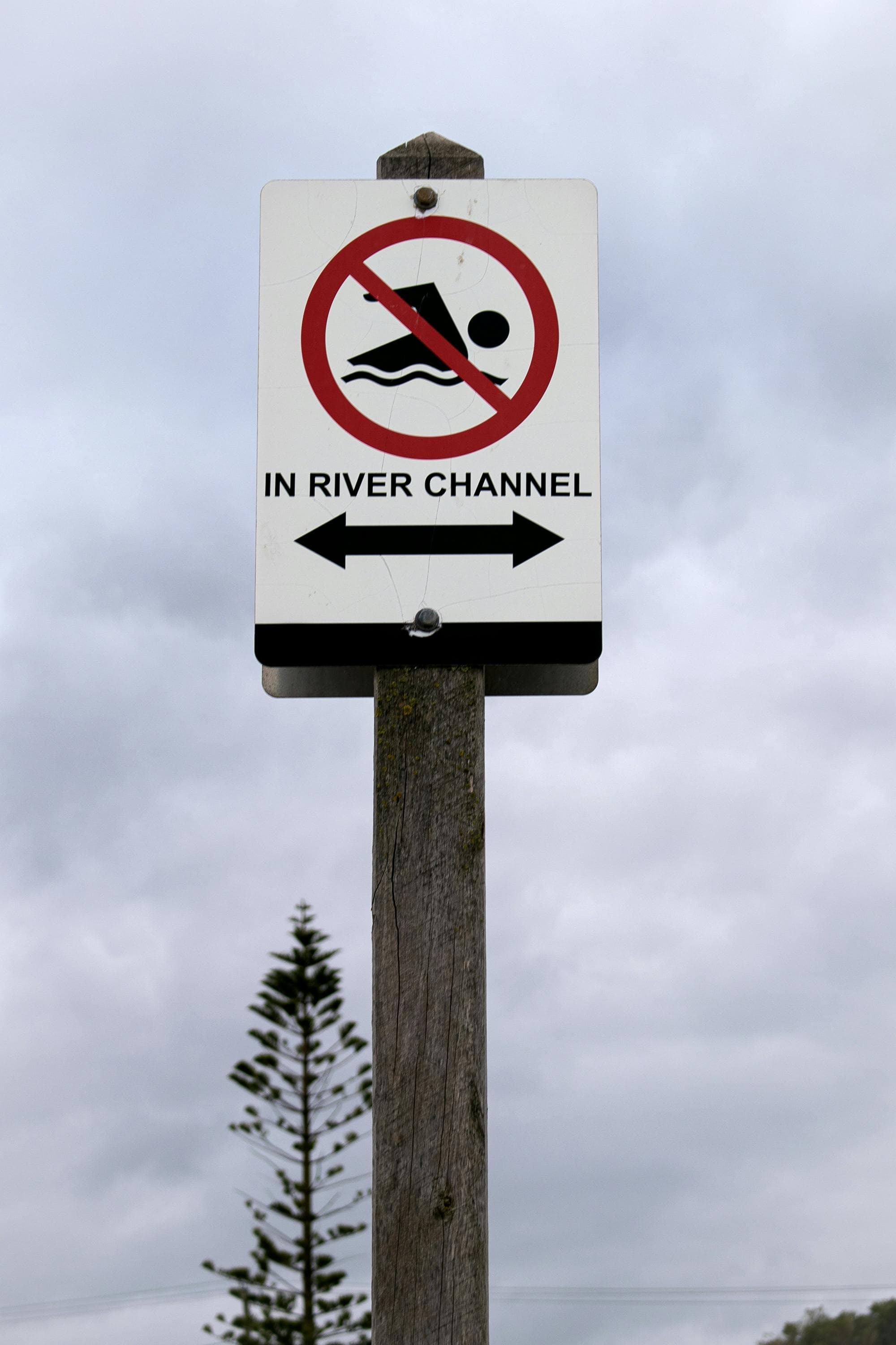 No swimming sign at the beach